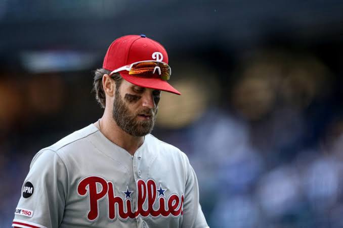 A Phillies teammate who never lived up to expectations is parted ways with Bryce Harper.
