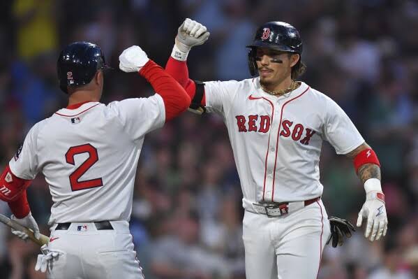 Devers hits a home run in the ninth to help the Red Sox defeat the Braves 7–6.
