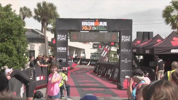Despite weather fears, volunteers help make the Gulf Coast Ironman 70.3 a success.