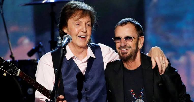 Paul McCartney, Sting, Elton John, Eric Clapton, Mark Knopfler & Phil Collins—together performing “Hey Jude” in a moment that can only be described as historic. Six legends. One stage. One unforgettable song. It is once in a lifetime opportunity to see all these legends at one stage performing together. A true celebration of music, unity, and timeless talent. You don’t see this every day—and may never again…