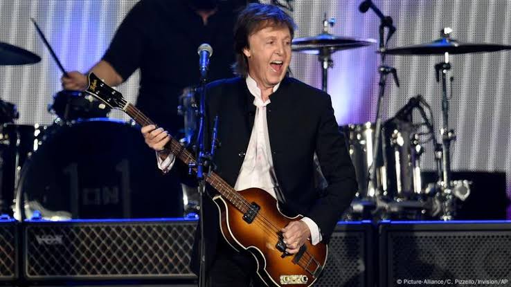 It was meant to be a quiet celebration — a wedding, a family, a few familiar faces. But as the last toast faded and the music softened, something unforgettable happened. From the edge of the crowd, Ringo Starr stepped forward. No fanfare. No announcement. Just a guitar in his hands and Paul McCartney watching, misty-eyed. What followed wasn’t a performance — it was a memory reborn. A Beatles song, raw and stripped bare, filled the room like a ghost returning home. For a moment, time collapsed. Two old friends. One sacred melody. And a night that felt like Abbey Road had been rebuilt under fairy lights. No, it wasn’t a reunion. But it felt like the one we’ve all been waiting for…