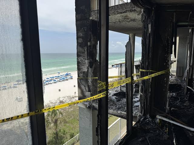 Firefighters arrive at the PCB condo fire scene.